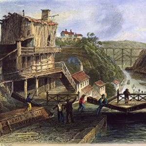 LOCKPORT, NEW YORK, 1838. A lock on the Erie Canal at Lockport, New York. Steel engraving, 1838, after William Henry Bartlett