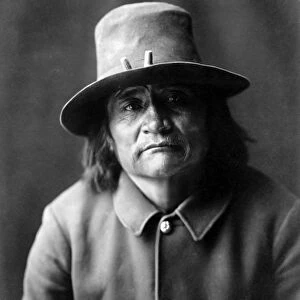 NAVAJO MAN, c1904. A policeman. Navajo man wearing a hat. Photograph by Edward Curtis
