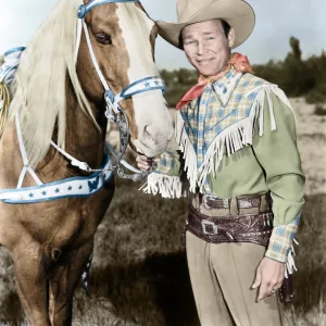 ROY ROGERS (1911-1998). Ne Leonard Slye. American singing cowboy actor. With his horse, Trigger