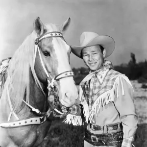 ROY ROGERS (1912-1998). Leonard Slye. American singing cowboy actor. With his horse, Trigger