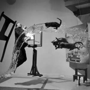 SALVADOR DALI (1904-1989). Spanish painter. Photographed with objects, including cats and water caught in surreal motion. Photographed by Philippe Halsman, c1948