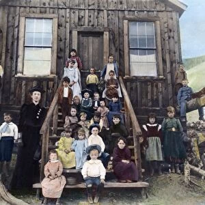 SCHOOLMISTRESS, 1893. Miss Blanche Lamont with her school in Hecla, Montana, October 1893
