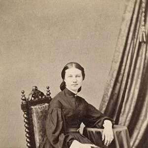 WOMAN, 19th CENTURY. A seated woman, photographed by Webster & Popkins in Hartford