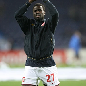 Arsenal defender Emmanuel Eboue waves to the fans before the match