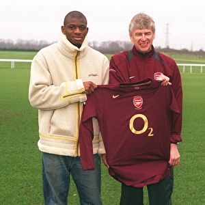 Arsenal manager Arsene Wenger with New signing Abou Diaby