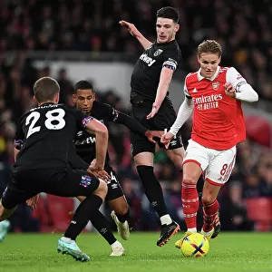 Arsenal vs. West Ham: Odegaard Clashes with Rice in Premier League Showdown (December 2022)