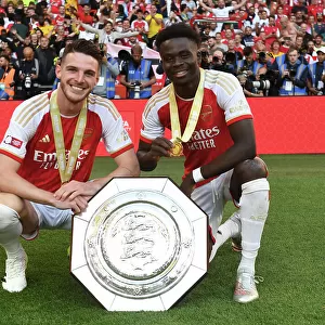 Arsenal's Bukayo Saka and Declan Rice Celebrate Community Shield Victory over Manchester City (2023-24)