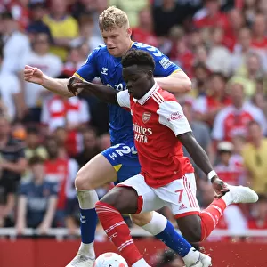 Arsenal's Bukayo Saka Faces Off Against Everton's Jarrad Branthwaite in Premier League Showdown