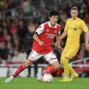 Arsenal's Tomiyasu in Action against FK Bodo/Glimt in Europa League Group A