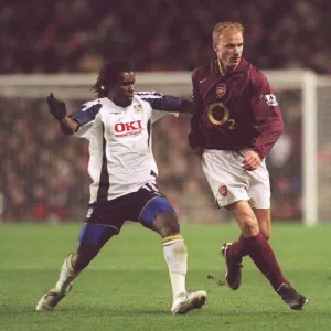 Dennis Bergkamp (Arsenal) Aliou Cisse (Portsmouth). Arsenal 4: 0 Portsmouth