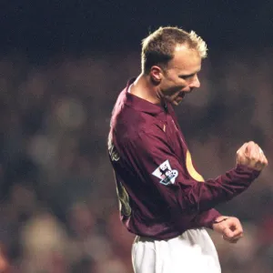 Dennis Bergkamp celebrates scoring Arsenals 1st goal. Arsenal 4: 0 Portsmouth