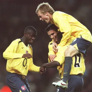 Emmanuel Eboue celebrates scoring Arsenals 1st goal with Sebastian Larsson