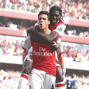 Fabregas and Adebayor: Arsenal's Unstoppable Duo Celebrate Goal Against Bolton Wanderers