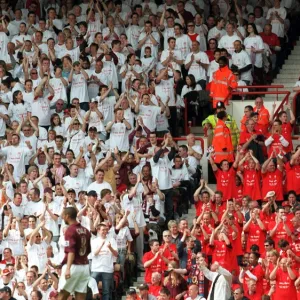 The fans in the North Bank with their I Was There T Shirts on