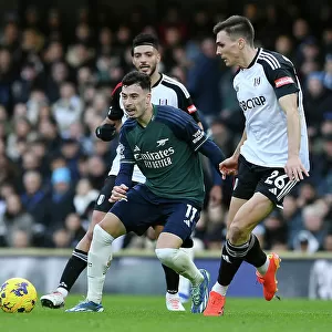 Fulham vs. Arsenal: Martinelli Fights for Possession in Intense Premier League Clash (2023-24)
