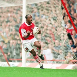 Ian Wright celebrates scoring his 100th goal for Arsenal