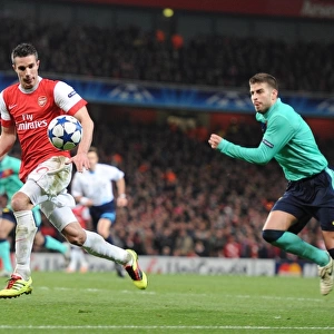 Robin van Persie breaks past Barcelona defender Gerard Pique to score the 1st Arsenal goal