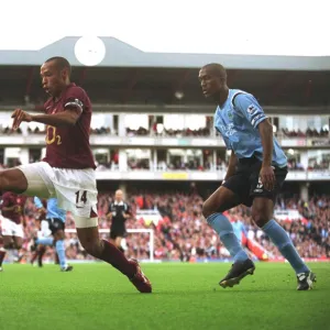 Thierry Henry (Arsenal) Sylvain Distin (Man City). Arsenal 1: 0 Manchester City