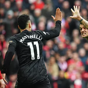 Xhaka and Martinelli Celebrate Arsenal's Victory over Liverpool in the 2022-23 Premier League