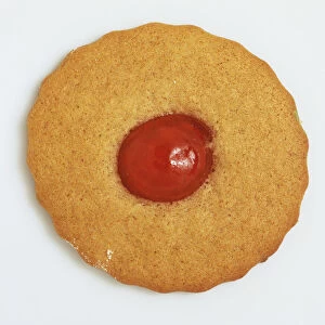 Biscuit with jelly at centre, close up