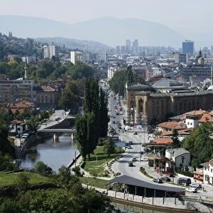 Bosnia and Herzegovina, Sarajevo, overview from hillside with river and distant mountains