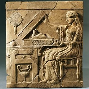 Italy, Calabria, Locri, Pinax depicting a young woman (probably Persephone) opening a box, terracotta