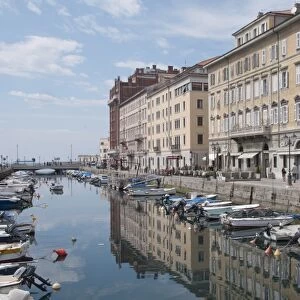 ITALY, Friuli-Venezia Giulia, Trieste, boats & houses along Canal Grande