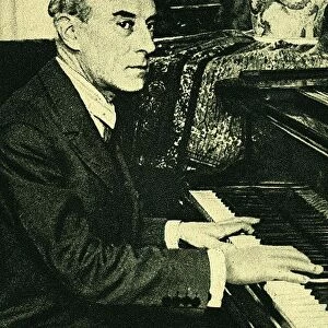 (Joseph) Maurice Ravel (1875-1937) French composer, at the piano. After a photograph