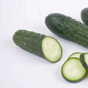Kirby cucumber, a type of pickling cucumber, whole and sliced