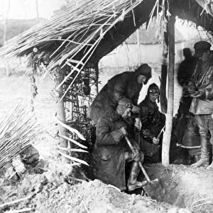 Kolkhoz (collective farm) workers discover a cache of rotting wheat hidden near a kulak (rich peasant)s house, kurgansky region, soviet union, 1932