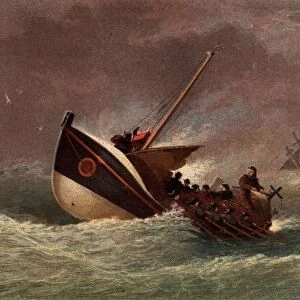 Lifeboat in the livery of the Royal National Lifeboat Institution in heavy seas returning