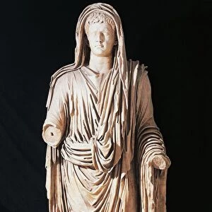 Marble statue of Emperor Tiberius wearing toga