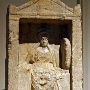 Marble votive relief with Cybele enthroned