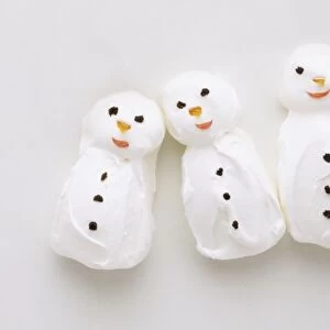 Four meringue snowmen