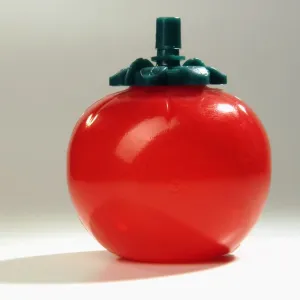 Plastic tomato-shaped ketchup dispenser