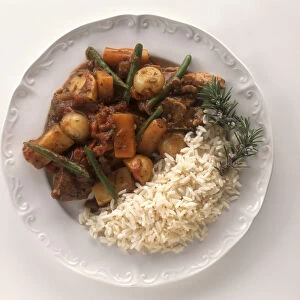 Plate of Arni Me Votana, casserole of lamb, carrots, potatoes and green beans served with rice, a typical dish from Greece, view from above