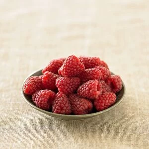 Raspberries in small bowl