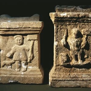 Two small altars with bas-reliefs depicting the Gallic God Sucellus holding an olla in one hand and a wooden mallet in the other