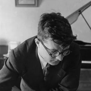 Soviet composer, dmitri shostakovich, working in his study, 1938