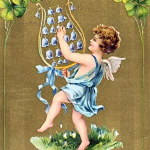 To My True Love, c1910. American Valentine card. Cupid dances on grass with naturalised Snowdrops