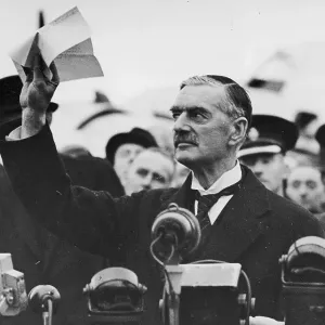 Print of Neville Chamberlain returning from Munich, declaring Peace in our time Print of Neville Chamberlain returning from Munich, declaring Peace in our time