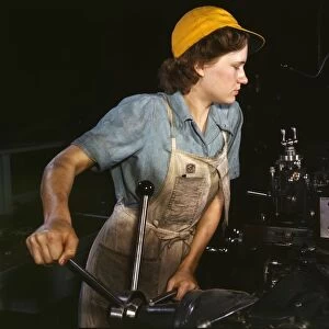 World War II: USA female war worker in the 1940s. During the war women on the home