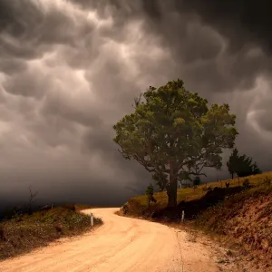 Country Road Against Dark Clouds