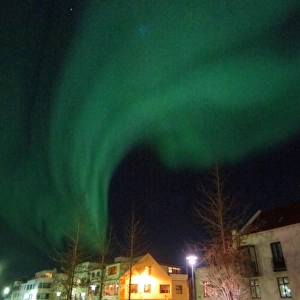 Reykjavik modern architecture apartment blocks and aurora borealis northern lights