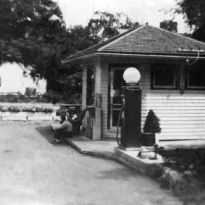 archival, black & white, c, caucasian, full-length, gas pump, gas station, historical