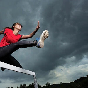 Athlete, 20 years, jumping hurdles, Winterbach, Baden-Wurttemberg, Germany