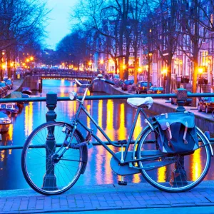 A bicycle on a bridge at dusk, Amsterdam