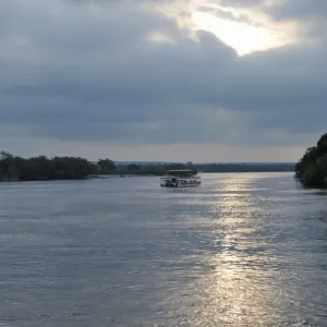 Evening cruise aside The Victoria Falls in Zambia at sunset