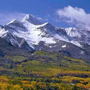 Fresh snow on Mount Wilson and forest in autumn colors, Uncompahgre National Forest, Colorado, USA