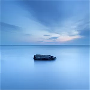 Lone rock in sea